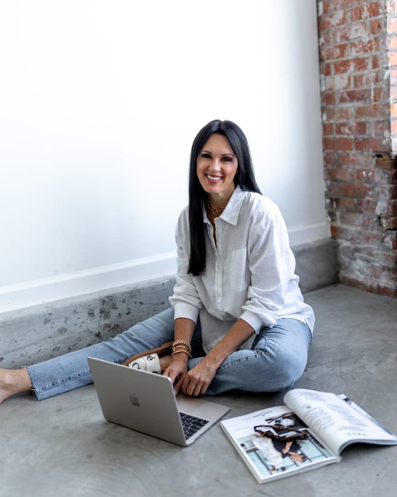Tracy on floor with laptop